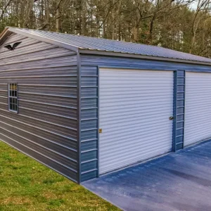 A 24X25X9 Vertical Roof Metal Garage with two doors and a blue roof.