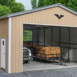 A 24X30X10 Vertical Roof Metal Garage with hay in it.