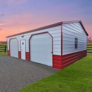 A red and white 24X30X9 Vertical Roof Metal Garage with a fence in the background.