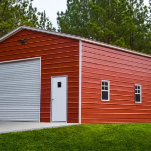 A red 24X40X12 Vertical Roof Metal Garage with two doors.