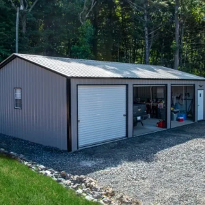 A 24X40X9 Vertical Roof Metal Garage, featuring a 24X40X9 size and a garage door.