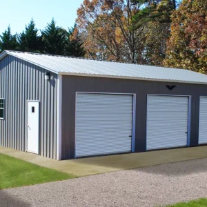 A 28X40X10 Vertical Roof Metal Garage measuring 28x40x10, featuring two garage doors.