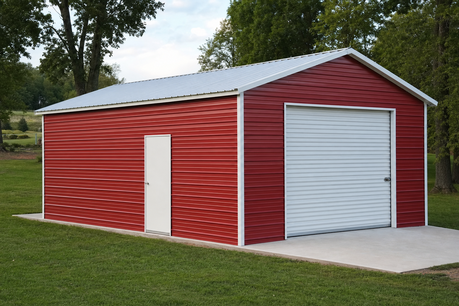 Red metal garage building with white roll-up door on grass