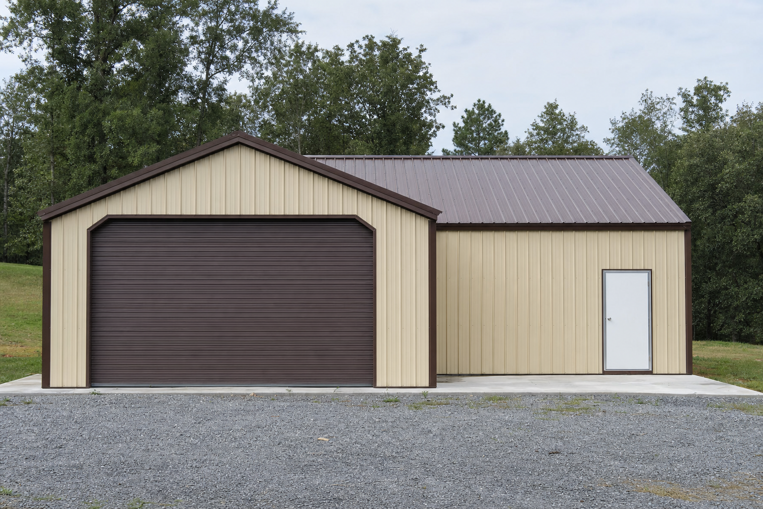 Metal garage building with brown roll-up door and lean-to