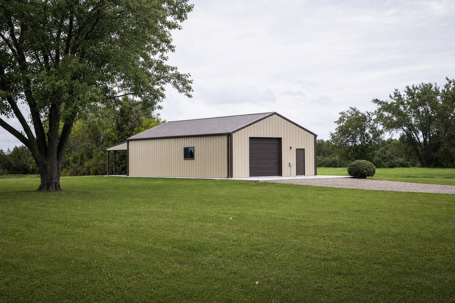 Metal pole barn building on green rural property